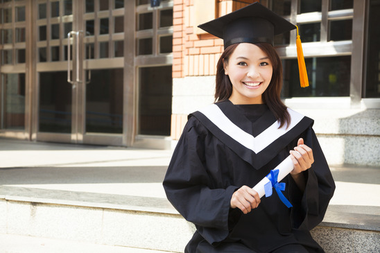 Student with her college degree